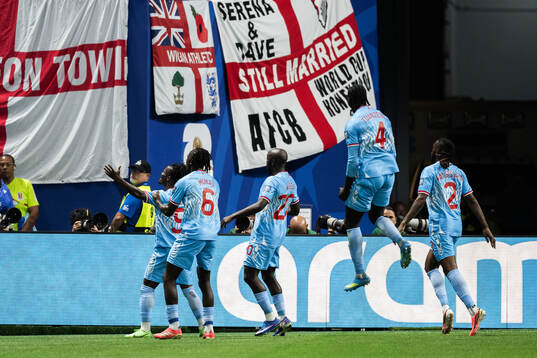 Players of Congo DR celebrate 0-1