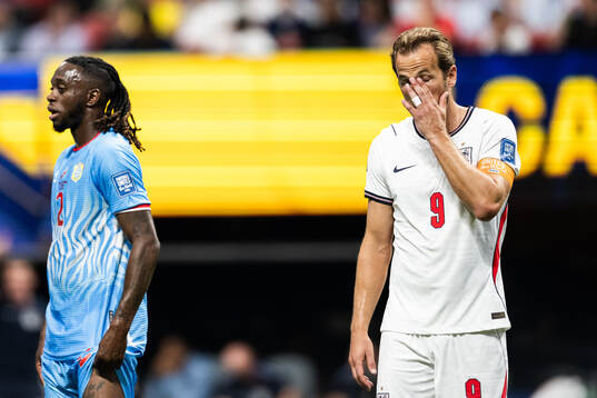 Harry Kane of England looks dejected