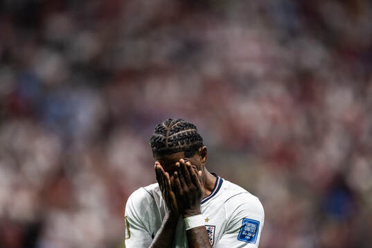 Marcus Rashford of England looks dejected