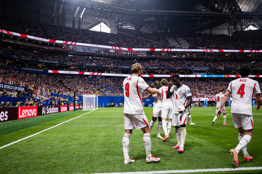 Harry Kane and Marc Guehi of England celebrate