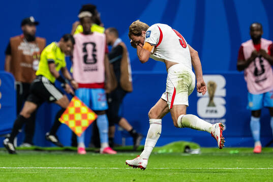 Harry Kane of England celebrates