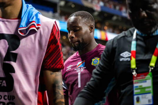 Goalkeeper Lionel Mpasi of Congo DR looks dejected