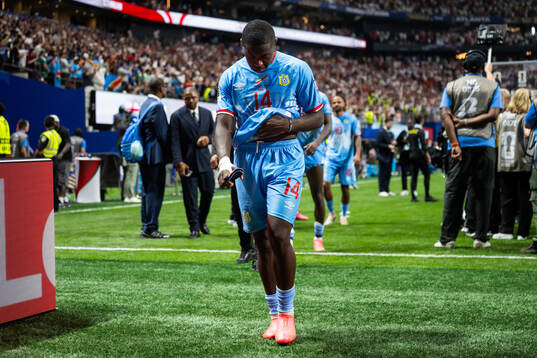Noah Sadiki of Congo DR looks dejected