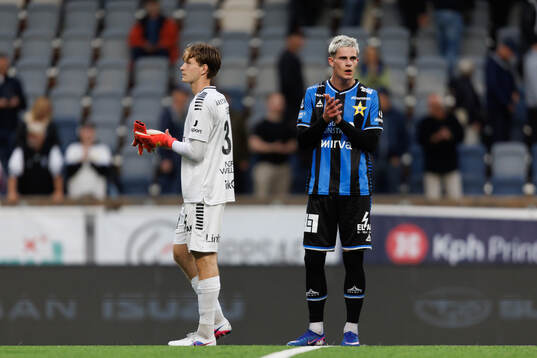 Sirius målvakt David Celic och Robbie Ure deppar