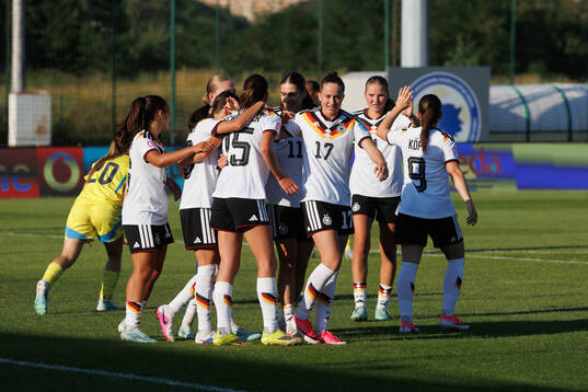 Maj Schneider of Germany celebrates scoring 2-0