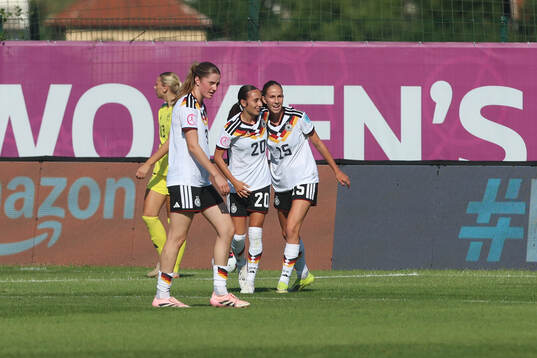 Emma Memminger and Maj Schneider of Germany celebrate