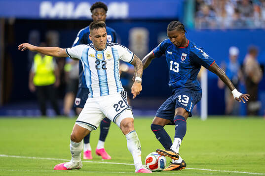 Lautaro Martinez of Argentina and Sidny Lopes Cabral of