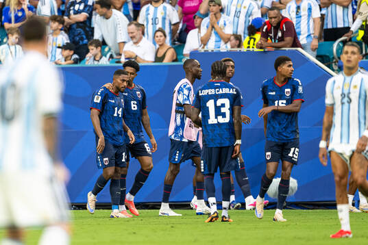 Deroy Duarte and Kevin Pina of Cabo Verde  celebrate