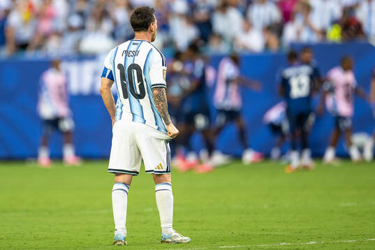 Lionel Messi of Argentina looks dejected
