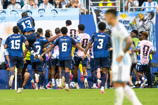 Players of Cabo Verde celebrate 1-1