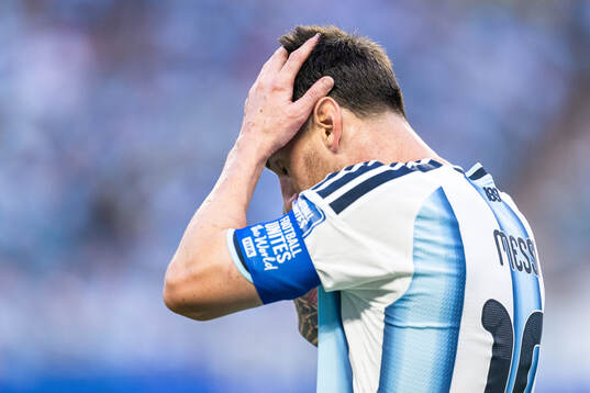 Lionel Messi of Argentina looks dejected