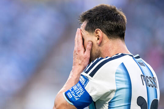 Lionel Messi of Argentina looks dejected