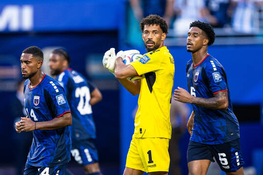 Deroy Duarte, goalkeeper Vozinha and Kevin Pina of Cabo