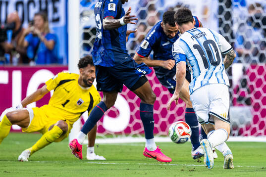 Goalkeeper Vozinha of Cabo Verde and Lionel Messi of
