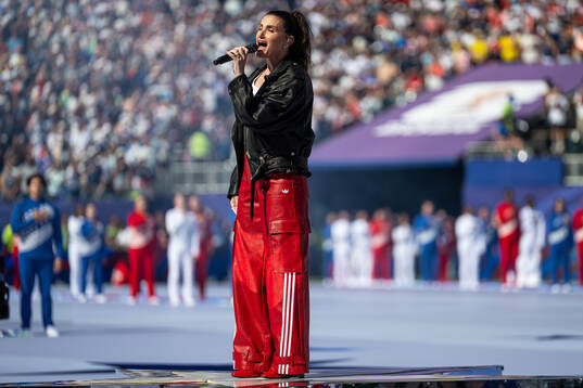 Idina Menzel, artist, sings the national anthem of the