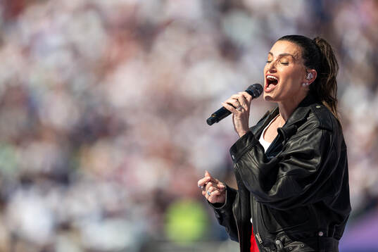 Idina Menzel, artist, sings the national anthem of the