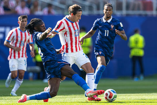 Manu Kone and Michael Olise of France and Matias Galarza of