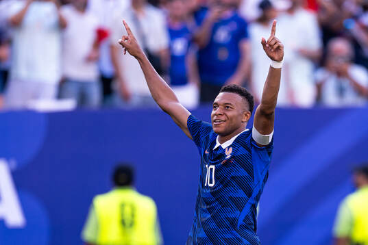 Kylian Mbappe of France celebrates