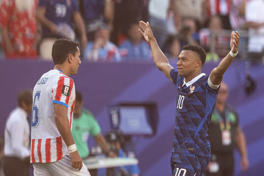 Kylian Mbappe of France celebrates