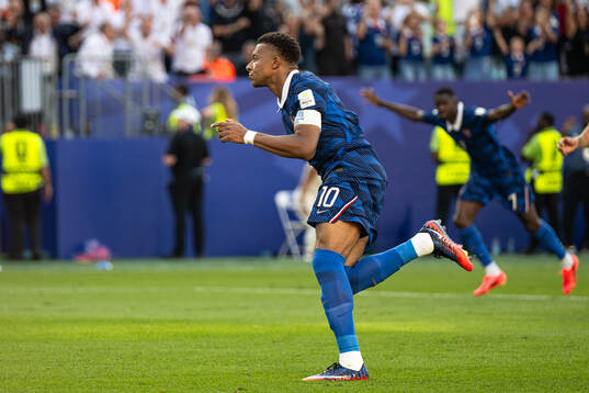 Kylian Mbappe of France celebrates