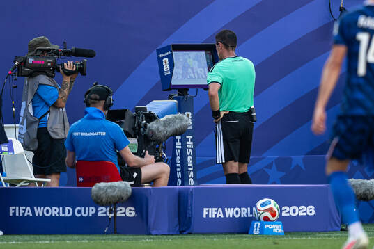 Referee Ilgiz Tantashev with a VAR-check