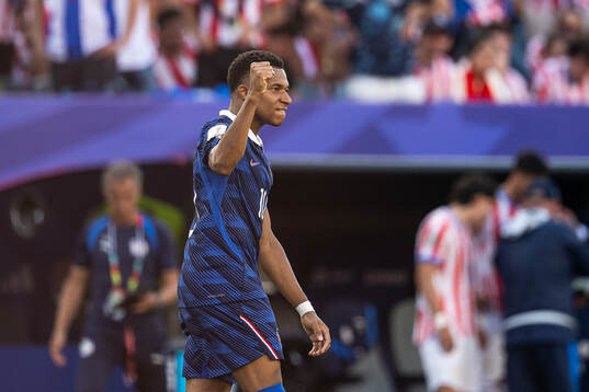 Kylian Mbappe of France celebrates