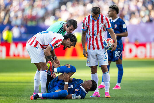 Kylian Mbappe of France in pain