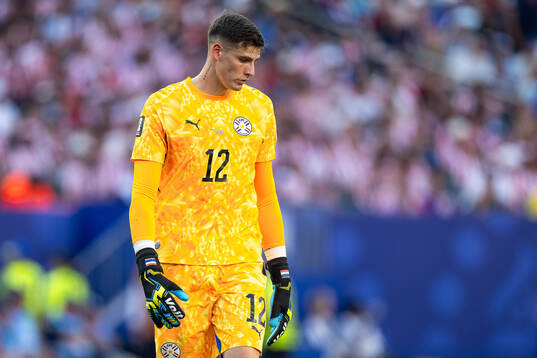 Goalkeeper Orlando Gill of Paraguay looks dejected