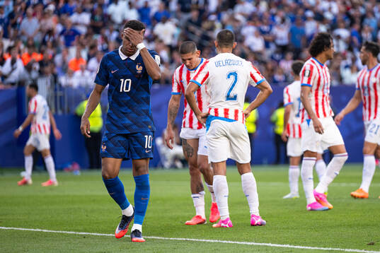 Kylian Mbappe of France looks dejected