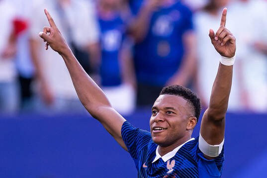 Kylian Mbappe of France celebrates