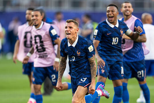 Lucas Digne of France celebrates