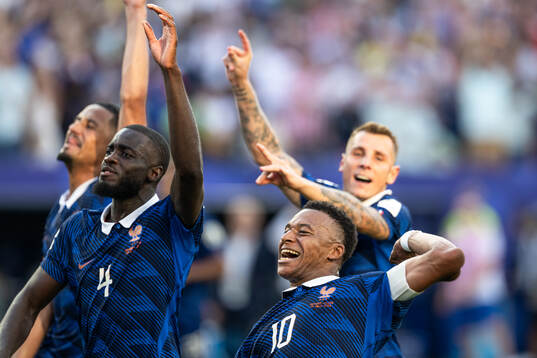 Dayot Upamecano and Kylian Mbappe of France celebrate