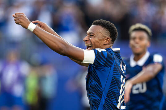 Kylian Mbappe of France celebrates