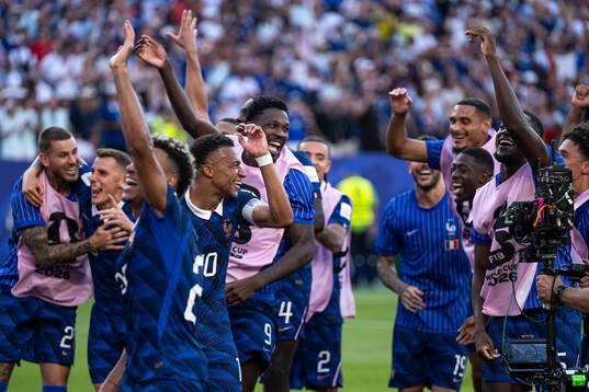 Players of France celebrate