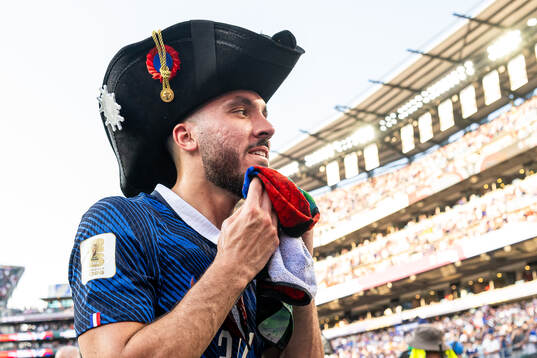 Rayan Cherki of France celebrates