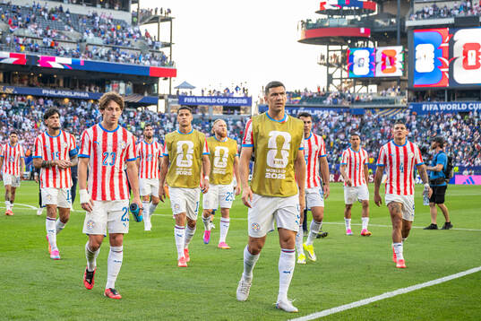 Matias Galarza and Antonio Sanabria of Paraguay look