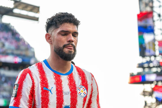Omar Alderete of Paraguay looks dejected