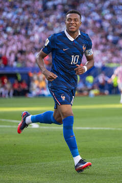 Kylian Mbappe of France celebrates