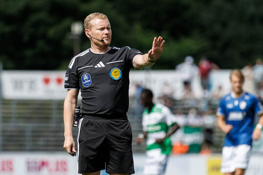 Domare Fredrik Klitte