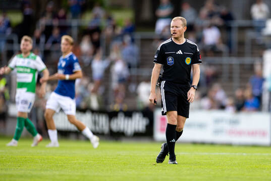 Domare Fredrik Klitte