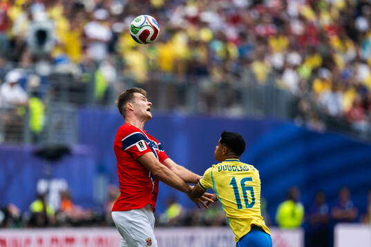 Alexander Sørloth of Norway and Douglas Santos of Brazil