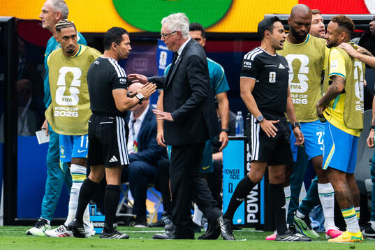 Head coach Carlo Ancelotti of Brazil and referee Ismail