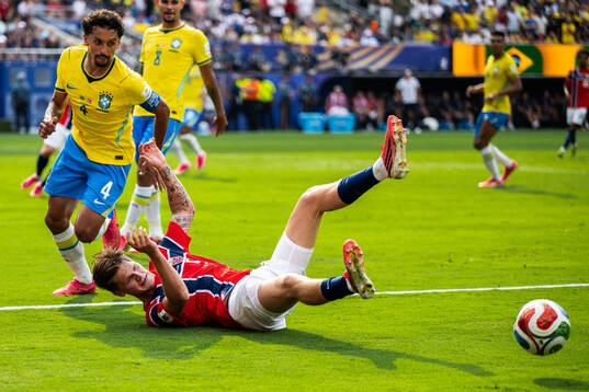 Marquinhos of Brazil and David Møller Wolfe of Norway
