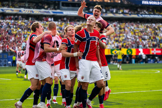 Erling Braut Haaland of Norway celebrate with team mates