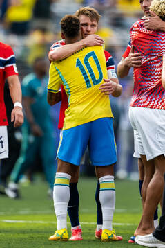 Martin Ødegaard of Norway and Neymar Jr of Brazil