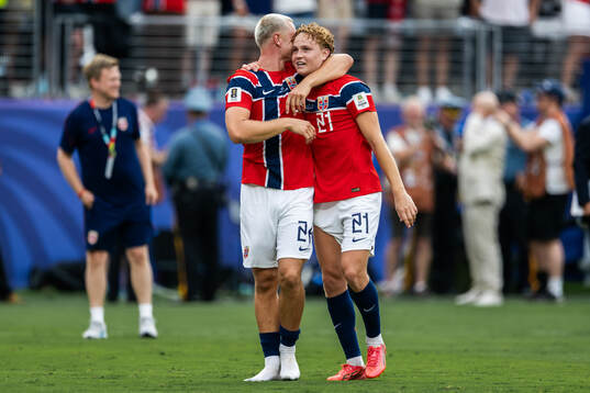 Julian Ryerson and Andreas Schjelderup of Norway celebrate