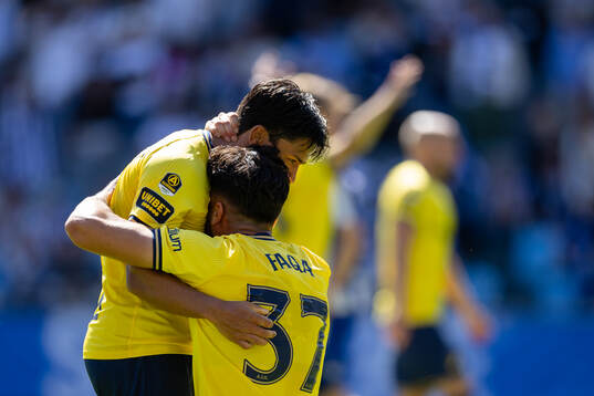 AIKs Lukas Bergquist och Ahmad Faqa jublar