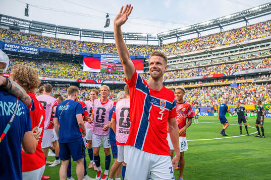 Kristoffer Ajer of Norway celebrates