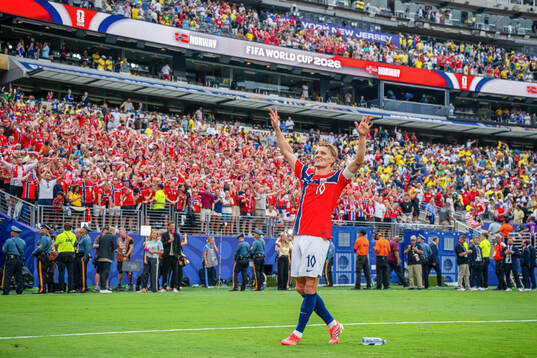 Martin Ødegaard of Norway celebrates