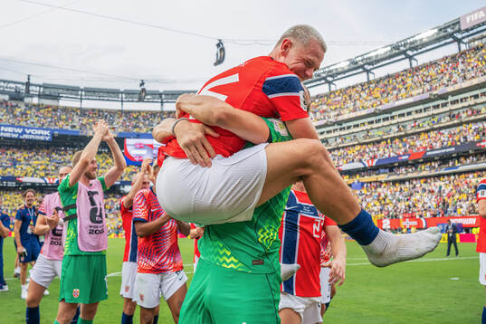 Julian Ryerson and goalkeeper Ørjan Nyland of Norway